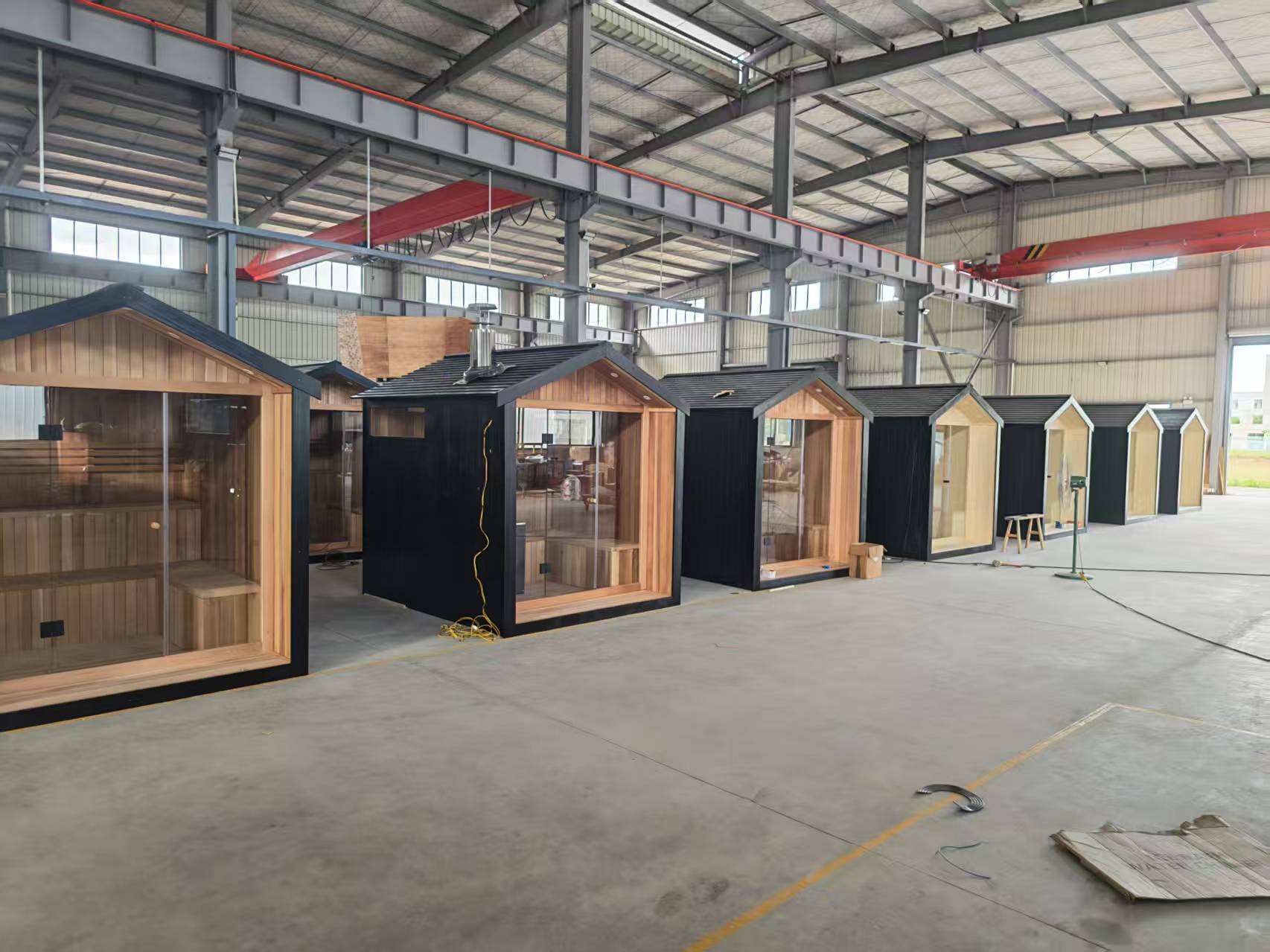 Outdoor barrel sauna manufacturing at CSauna factory