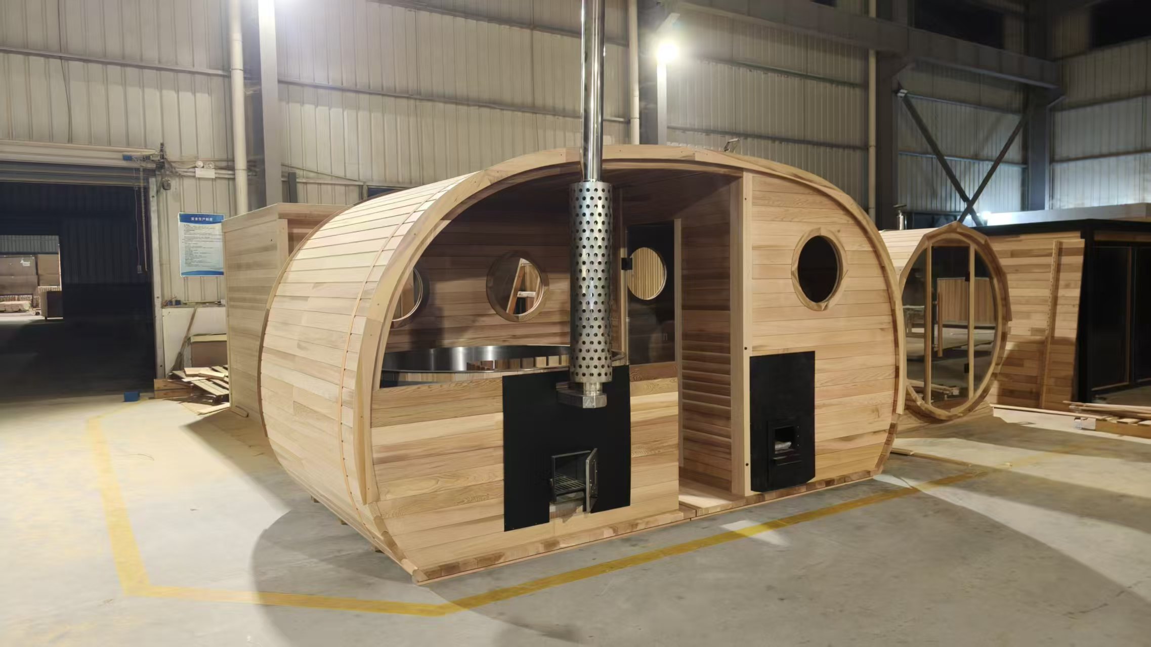CSauna outdoor barrel sauna with wood-fired heater chimney