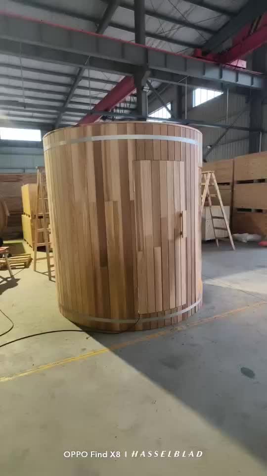 Barrel sauna product displayed inside CSauna workshop