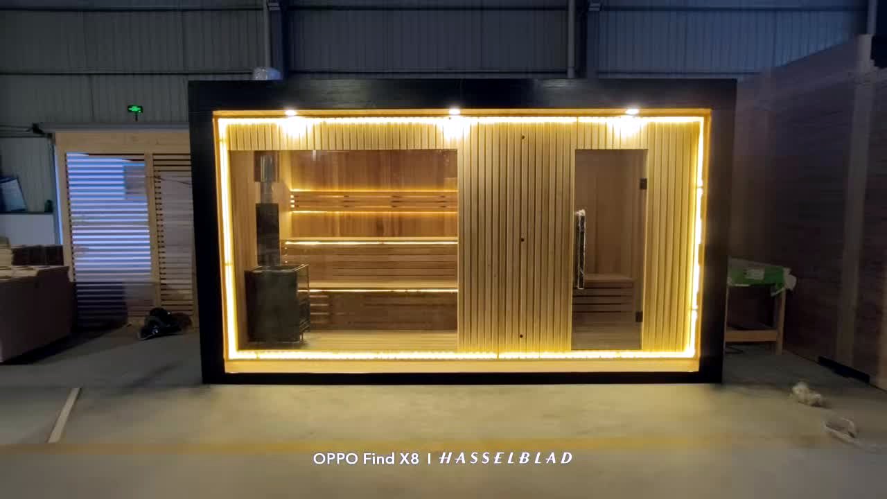 Full-glass sauna display in workshop
