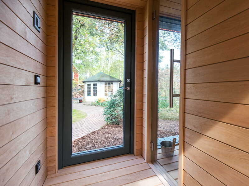 Dark Exterior Outdoor Sauna with Corner Window and Blue Bench Lighting CSA-532 product view 3