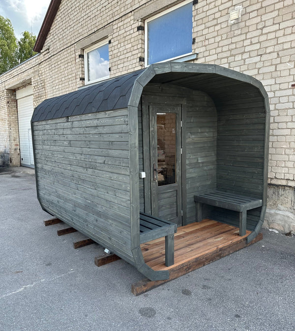Modern Curved Sauna Pod with Integrated Porch, Weatherproof Dark Grey Exterior &amp; Wood Heater for Year-Round Outdoor Relaxation Side profile