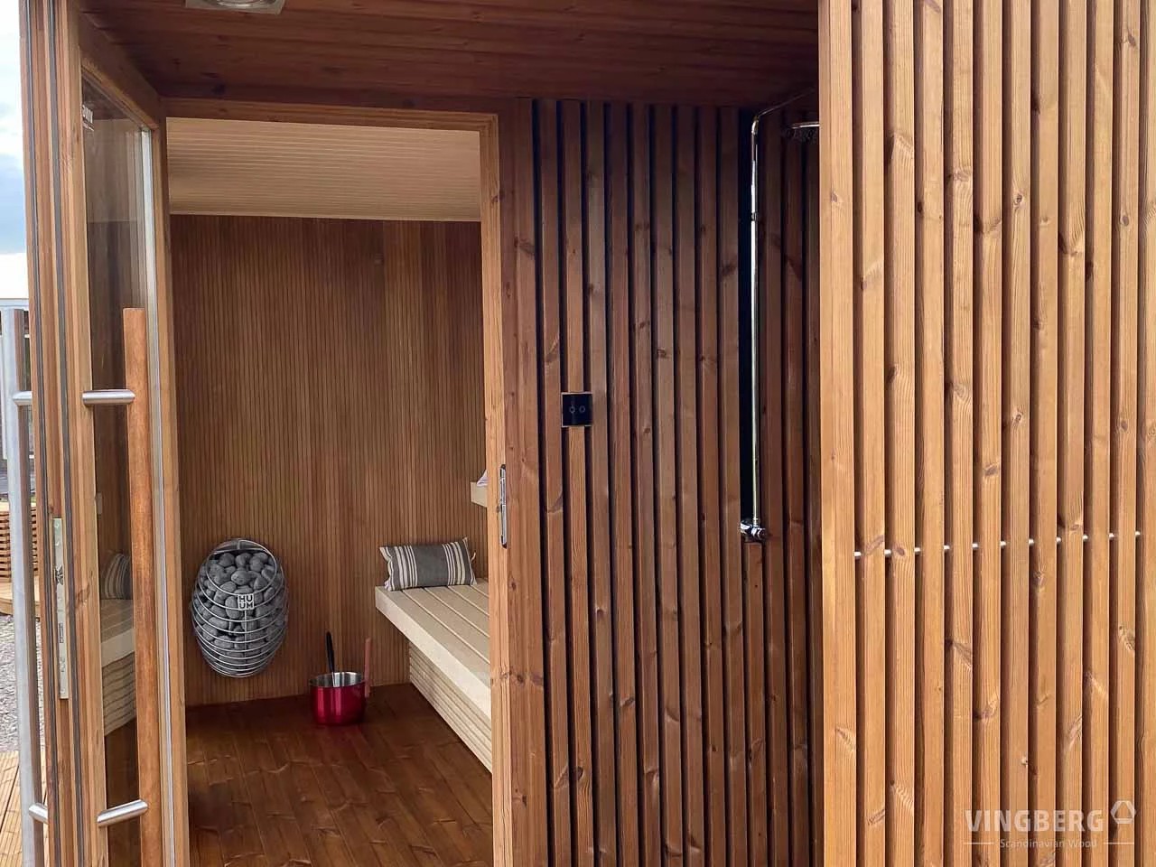 Modern Outdoor Sauna Cabin with Large Glass Facade %7C Luxury Wooden Spa Room Side profile