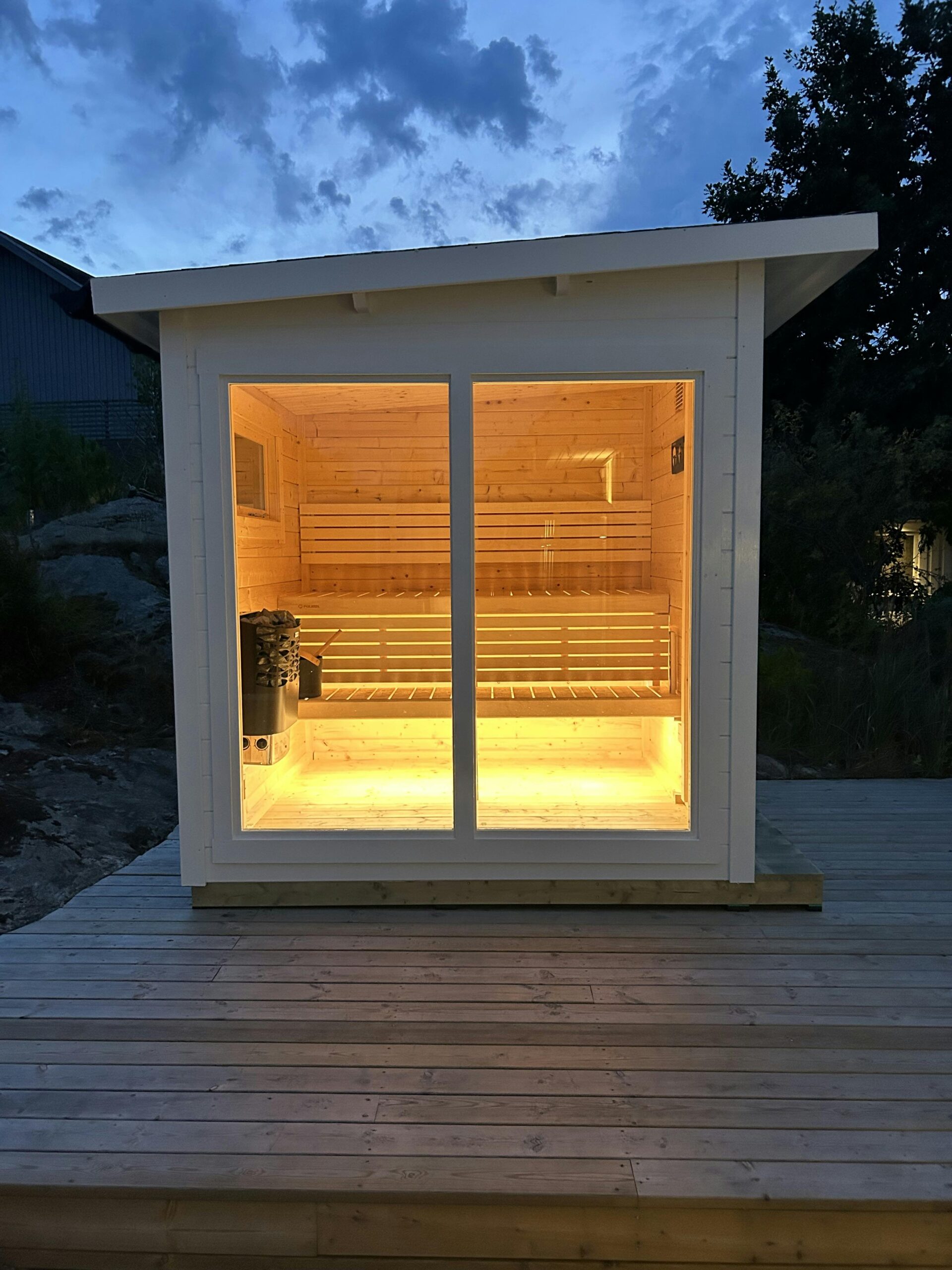 Modern White Outdoor Sauna Cabin, Compact Wood Sauna with Glass Facade Exterior angle