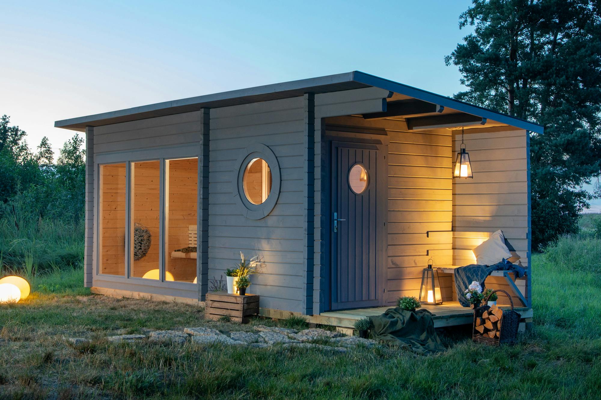 Nordic Grey Cabin Sauna with Patio, Outdoor Sauna with Full Glass Facade and Round Windows Interior detail