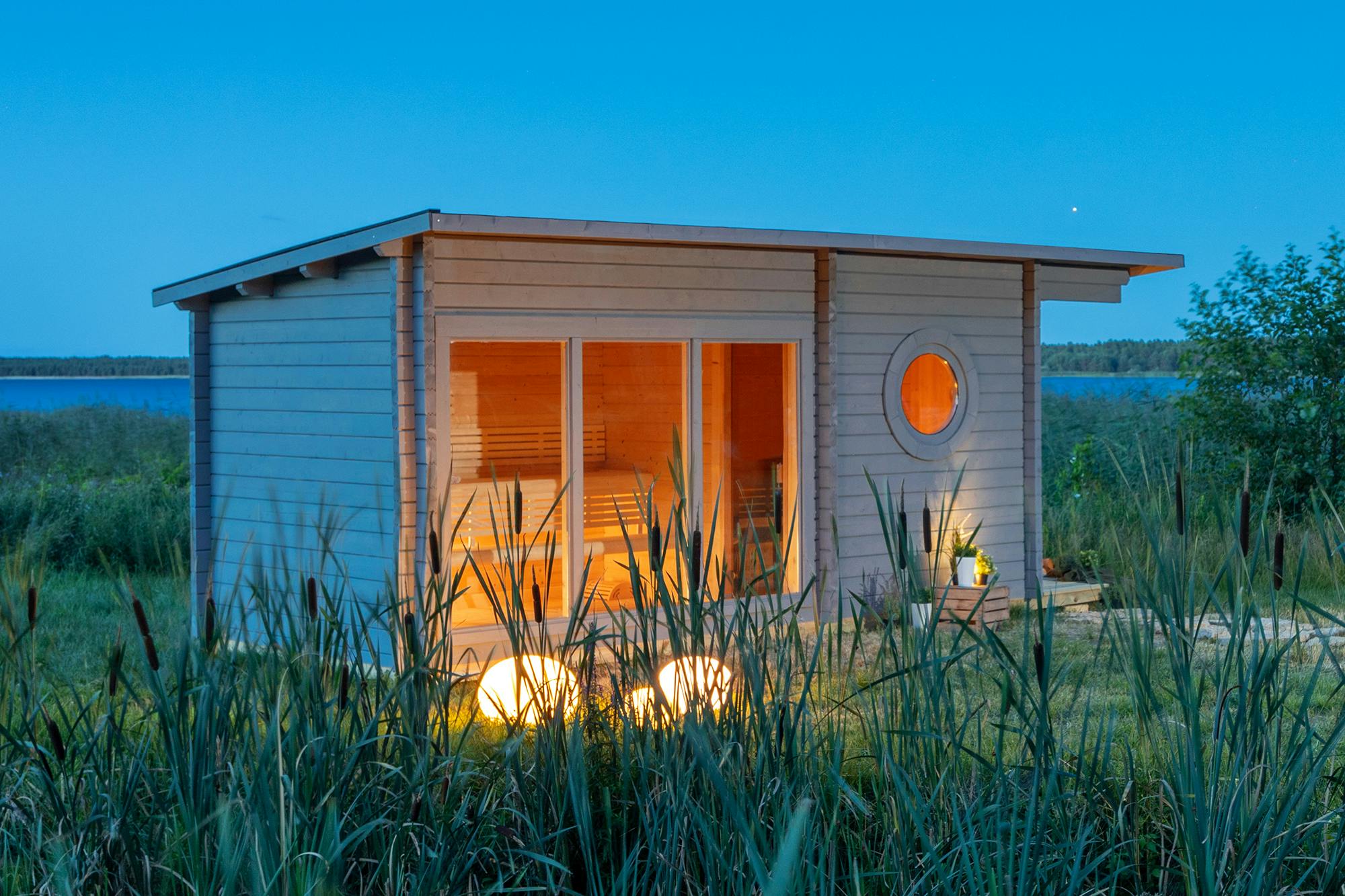 Nordic Grey Cabin Sauna with Patio, Outdoor Sauna with Full Glass Facade and Round Windows Side profile