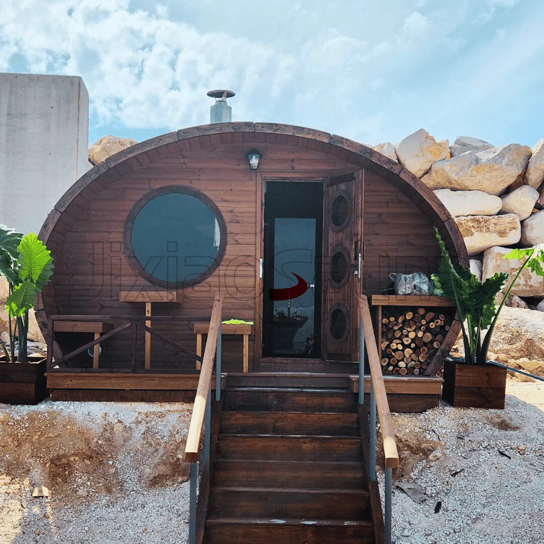 Outdoor Barrel Sauna Suite %7C Traditional Wood-Burning Stove %7C Rustic Wellness Retreat Exterior angle