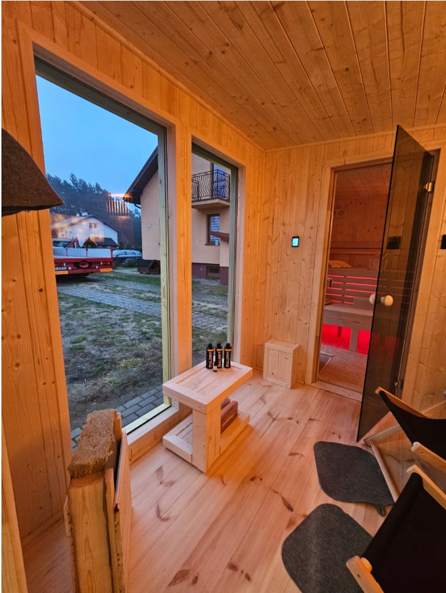 Spacious Outdoor Sauna Cabin with Covered Porch %7C Large Glass Window Wooden Spa Interior detail