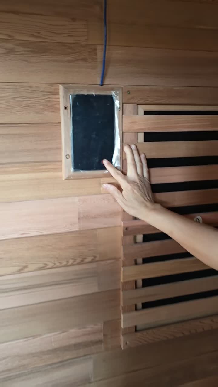Sauna interior detail with bench and heater area