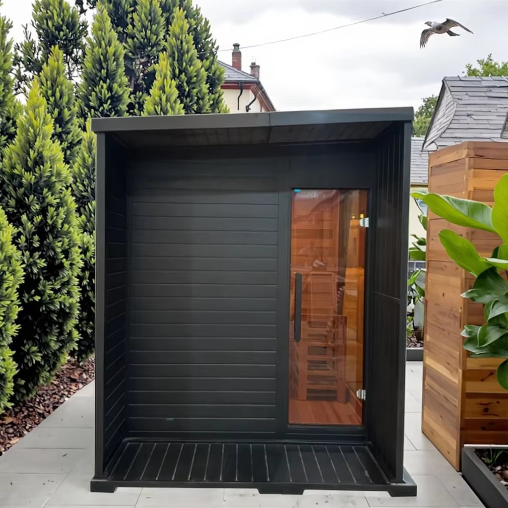 Compact Black Outdoor Sauna with Side Glass installed exterior view